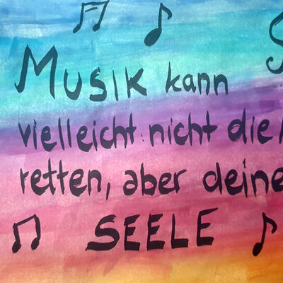 Bild vergrößern: Auf dem Foto ist zu lesen: "Musik kann vielleicht nicht die Welt retten, aber deine Seele."